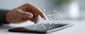 Finger touching digital network on tablet. Connectivity, innovation, tech concept. Ideal for articles about AI, future tech, Royalty Free Stock Photo