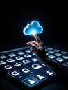 A finger touching a glowing blue cloud icon on a digital interface, representing cloud technology and data access Royalty Free Stock Photo