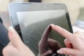 Finger touching screen of tablet computer Royalty Free Stock Photo