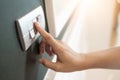 Finger is turning on or off on light switch Royalty Free Stock Photo
