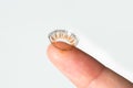 Finger of woman holding with contact lens Royalty Free Stock Photo