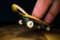 Fingerboard. A small skateboard for kids and teenagers to play with hand fingers. Youth culture, extreme sport