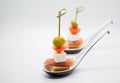 Fingerfood served on white spoons Royalty Free Stock Photo