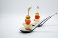 Fingerfood served on white spoons Royalty Free Stock Photo