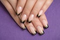 Fingernails with black french manicure Royalty Free Stock Photo