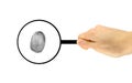 The fingerprint is considered under a magnifying glass