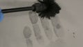 Fingerprints, Magnetic Powder Applicator develops latent print on grey paper