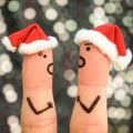 Fingers art of couple celebrates Christmas. Royalty Free Stock Photo