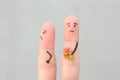 Fingers art of couple. Man gives a woman a bouquet of flowers, she is not satisfied Royalty Free Stock Photo