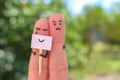 Fingers art of couple. woman hiding emotions, man is