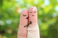 Fingers art of displeased couple. Man is sick, woman feels sorry for him.