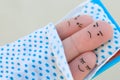 Fingers art of  family sleep together. Concept of child prevents parents from sleeping Royalty Free Stock Photo