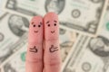 Fingers art of a Happy couple on background of money. Royalty Free Stock Photo