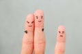 Fingers art of happy couple. Child is angry