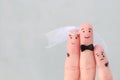 Fingers art of Happy couple to get married. Concept of stepson vs wedding Royalty Free Stock Photo