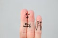 Fingers art of happy family. Concept of couple kisses,  child spies on them Royalty Free Stock Photo