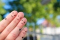 Fingers art of happy family.  The concept of a walk in the autumn park Royalty Free Stock Photo