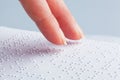 Fingers and Braille. Blind read. Royalty Free Stock Photo