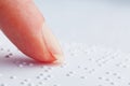 Fingers and Braille. Blind read. Royalty Free Stock Photo