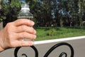 fingers of an elderly woman sore joints rheumatoid arthritis, holding a water bottle ,