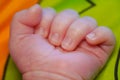 Fingers on hand with the nails of a newborn baby. close up view macro closeup Royalty Free Stock Photo