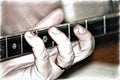 The fingers of the left hand slide over the metal strings on the neck of a bouzouki.