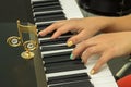 Fingers playing electronic piano keyboards Royalty Free Stock Photo