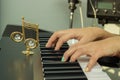 Fingers playing electronic piano keyboards Royalty Free Stock Photo