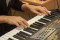 Fingers playing electronic piano keyboards Royalty Free Stock Photo