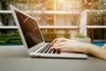 Fingers typing on computer keyboard sunny day Royalty Free Stock Photo