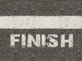 Finish word on asphalt road