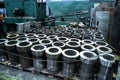 Finished metal cylindrical round tubular pipe products in metal processing plant Royalty Free Stock Photo