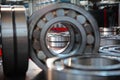 Finished products made of closed and open type bearings. The product is out of focus and the image is blurred. The concept of