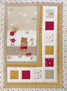 Finished quilt with tiny bear