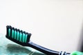 Finished used black and greenness tootbrush Royalty Free Stock Photo