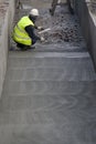 Finishing concrete surface with spatula Royalty Free Stock Photo