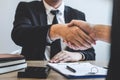 Finishing to successful deal of real estate, Broker and client shaking hands after signing contract approved application form, Royalty Free Stock Photo