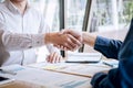 Finishing up a conversation after collaboration, handshake of two business people after contract agreement to become a partner, Royalty Free Stock Photo