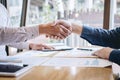 Finishing up a conversation after collaboration, handshake of two business people after contract agreement to become a partner, Royalty Free Stock Photo