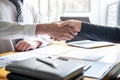 Finishing up a conversation after collaboration, handshake of two business people after contract agreement to become a partner, Royalty Free Stock Photo