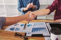 Finishing up a meeting, handshake of two happy business people after contract agreement to become a partner, collaborative Royalty Free Stock Photo