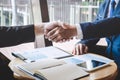 Finishing up a meeting, handshake of two happy business people after contract agreement to become a partner, collaborative Royalty Free Stock Photo