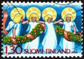 FINLAND - CIRCA 1986: A stamp printed in Finland from the `Christmas` issue shows Angels and Garland, circa 1986.