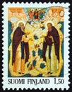 FINLAND - CIRCA 1985: A stamp printed in Finland shows Saints Sergei and Herman icon, Petros Sasaki, circa 1985.