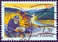 FINLAND - CIRCA 1983: A stamp printed in Finland from the `Northern edition - Tourism` issue shows gold panner in North Finland