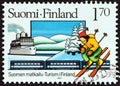 FINLAND - CIRCA 1987: A stamp printed in Finland shows Borea liner, Diesel Train, Snow Scene and Skier, circa 1987.