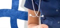 Finland flag female doctor with stethoscope