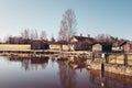 Finland Forssa, Loimijoki river at Kuhalankoski, a small boats marina at summer and with a dam on it`s side. On a spring