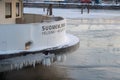 FINLAND, HELSINKI - JANUARY 2015: Local ferry to Suomenlinna in winter parked in ice