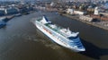 Finland, Helsinki. Summer evening. The ship, white cruise passenger liner, leaves the city port. Panorama of the capital, view on Royalty Free Stock Photo